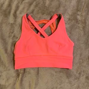 Born primitive pink sports bra